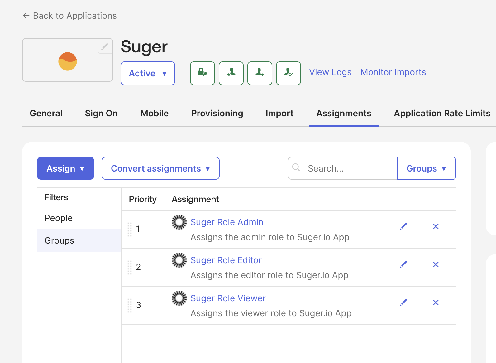 Fours role groups assigned to the Suger app in Okta